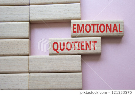 Emotional Quotient symbol. Wooden blocks with words Emotional Quotient. Beautiful pink background. Business and Emotional Quotient concept. Copy space. 121533570