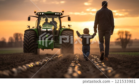 Father and Child Walking in Farm at Sunset 121533981