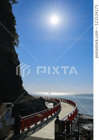 Enoshima: A place of faith in Enoshima. A view from Iwaya Bridge leading to the cave of Iwaya (First Iwaya). Enoshima: A place of faith in Enoshima. A view from Iwaya Bridge leading to the cave of Iwaya (First Iwaya). 121534171