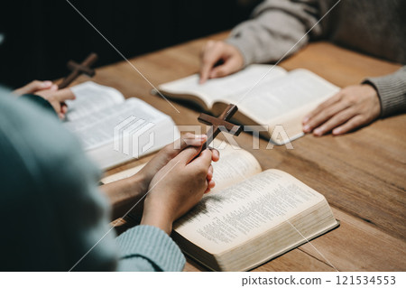 Christians are congregants join hands to pray and seek the blessings of God. Christians are congregants join hands to pray and seek the blessings of God. 121534553