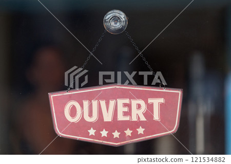 Open sign written in French 121534882
