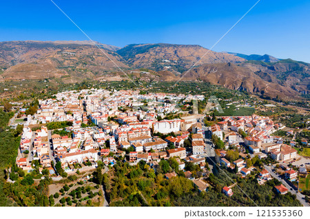 Orgiva town aerial panoramic view in Alpujarras, Spain 121535360