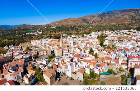 Orgiva town aerial panoramic view in Alpujarras, Spain Orgiva town aerial panoramic view in Alpujarras, Spain 121535363