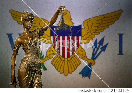 Lady Justice before a flag of the United States Virgin Islands Lady Justice before a flag of the United States Virgin Islands 121538109