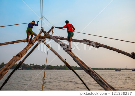 Fishermen and chinese fishing nets Fishermen and chinese fishing nets 121538257