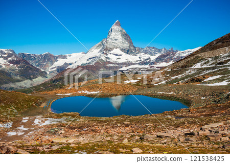 Riffelsee lake and Matterhorn, Switzerland Riffelsee lake and Matterhorn, Switzerland 121538425