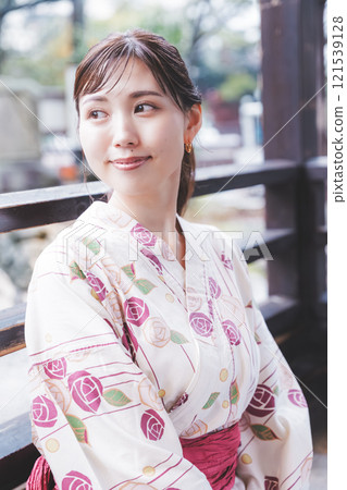A young woman in a yukata soaking her feet in a footbath (Filming cooperation: Shibata City Film Commission Council) A young woman in a yukata soaking her feet in a footbath (Filming cooperation: Shibata City Film Commission Council) 121539128