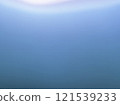 A photo of the surface of water with light shining from above - Gradient 121539233
