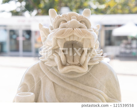 Marble sculpture symbolizing Buddhism in Asia inside a temple in Thailand. 121539558