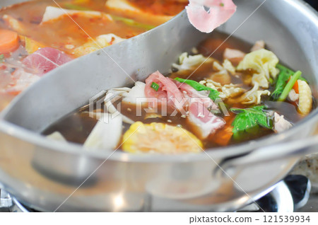 pork and vegetable soup, mixed vegetable soup or shabu shabu pork and vegetable soup, mixed vegetable soup or shabu shabu 121539934