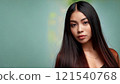 Studio shot of a young woman with long black hair 121540768