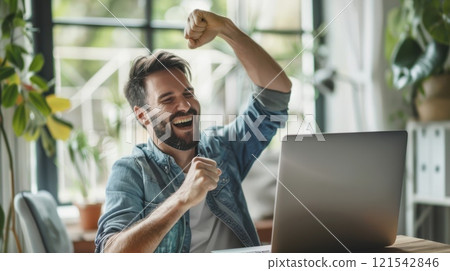 Successful Financial Transaction Celebration, Joyful man raising fist in victory while checking laptop screen with natural light background Successful Financial Transaction Celebration, Joyful man raising fist in victory while checking laptop screen with natural light background 121542846