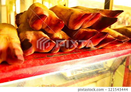 Pig's trotters for sale at a market, Uzbekistan Pig's trotters for sale at a market, Uzbekistan 121543444