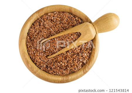flaxseed in wooden bowl isolated on white background. Top view. Flat lay 121543814