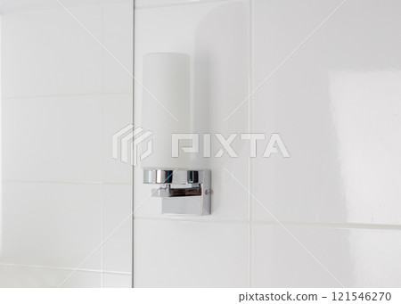 Modern Bathroom Wall Light Fixture on White Tile 121546270