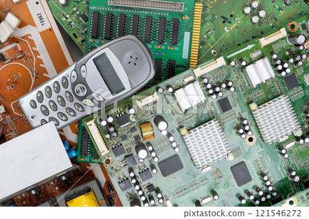 Electronic Waste with Old Mobile Phone and Circuit Boards Electronic Waste with Old Mobile Phone and Circuit Boards 121546272