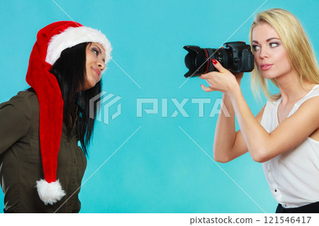 Photographer girl shooting images 121546417
