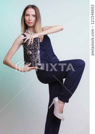 Elegant fashion woman with leather handbag Elegant fashion woman with leather handbag 121546602