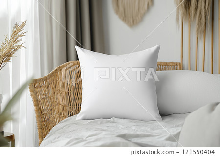 Clean white pillow on a neatly made bed in a serene bedroom environment with natural light Clean white pillow on a neatly made bed in a serene bedroom environment with natural light 121550404