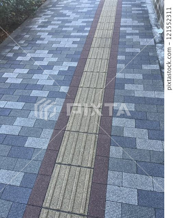 Road with Braille blocks 121552311