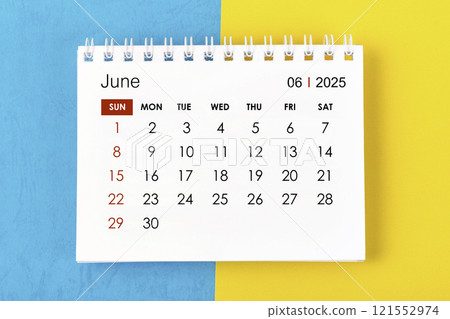 June 2025 Monthly desk calendar for 2025 year on blue and yellow. June 2025 Monthly desk calendar for 2025 year on blue and yellow. 121552974
