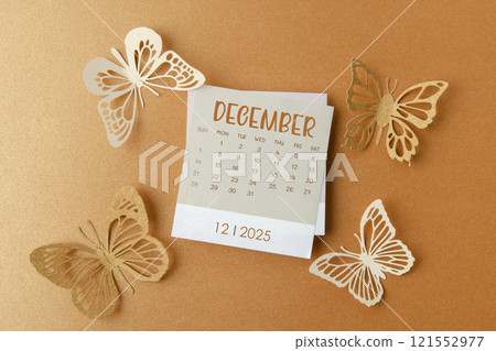 December 2025 calendar card with butterfly paper. 121552977