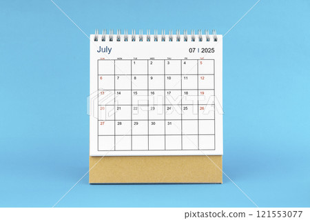 July 2025, Monthly desk calendar for 2025 year on Blue background. 121553077
