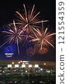 Ferris wheel and fireworks 121554359
