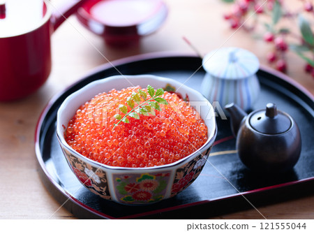 Salmon roe served on a plate 121555044