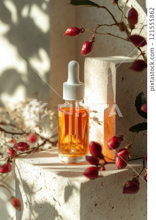 A bottle of perfume is sitting on a stack of bricks A bottle of perfume is sitting on a stack of bricks 121555862