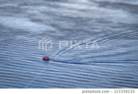 People on a water scooter 121556210