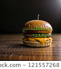Big hamburger with huge ham piece and a lot of cheese 121557268