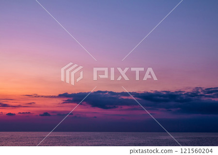 Scenic after-sunset crimson light on the sea Scenic after-sunset crimson light on the sea 121560204