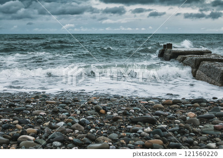 Stormy weather at the seaside. Big waves on the water 121560220