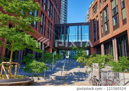 Modern red brick building with green tree in Copenhagen Modern red brick building with green tree in Copenhagen 121560524