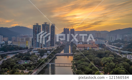 Modern Architecture Set Against a Dramatic Sunset Dec 22 2024 121560584