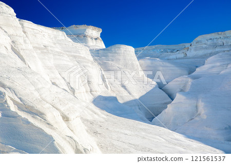 White chalk cliffs in Sarakiniko, Milos island, Cyclades, Greece White chalk cliffs in Sarakiniko, Milos island, Cyclades, Greece 121561537