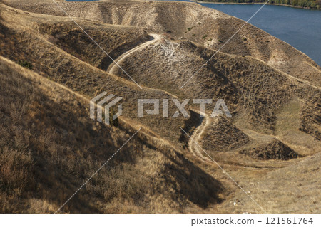 Scenic view of winding trails along the Shamb Reservoir in Syunik Province, Armenia Scenic view of winding trails along the Shamb Reservoir in Syunik Province, Armenia 121561764
