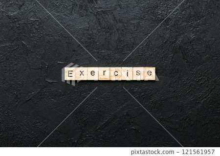 exercise word written on wood block. exercise text on table, concept exercise word written on wood block. exercise text on table, concept 121561957