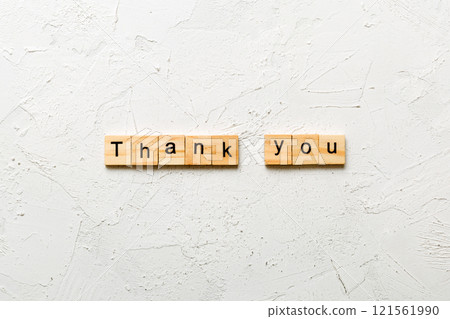 thank you word written on wood block. thank you text on table, concept thank you word written on wood block. thank you text on table, concept 121561990