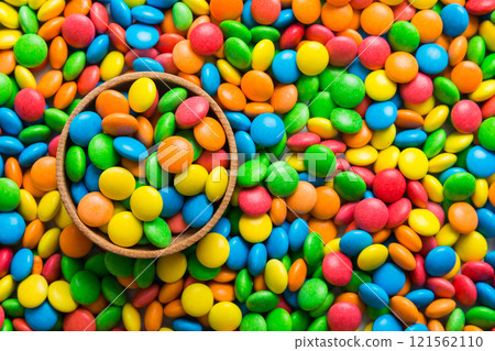 colorful candies as background top view. Seamless pattern with candy. Many sweet candies close-up colorful candies as background top view. Seamless pattern with candy. Many sweet candies close-up 121562110