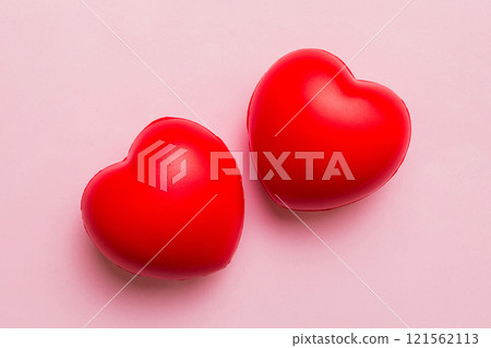 red heart shape on colored background. minimal concept top view with copy space red heart shape on colored background. minimal concept top view with copy space 121562113