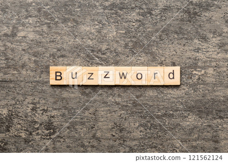 BUZZWORD word written on wood block. BUZZWORD text on cement table for your desing, concept BUZZWORD word written on wood block. BUZZWORD text on cement table for your desing, concept 121562124