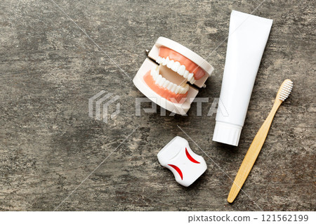 Mouthwash and other oral hygiene products on colored table top view with copy space. Flat lay. Dental hygiene. Oral care kit. Dentist concept 121562199