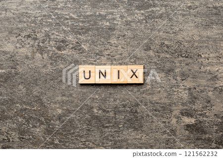 Unix word written on wood block. Unix text on table, concept 121562232