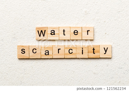 Water scarcity word written on wood block. Water scarcity text on cement table for your desing, concept Water scarcity word written on wood block. Water scarcity text on cement table for your desing, concept 121562234