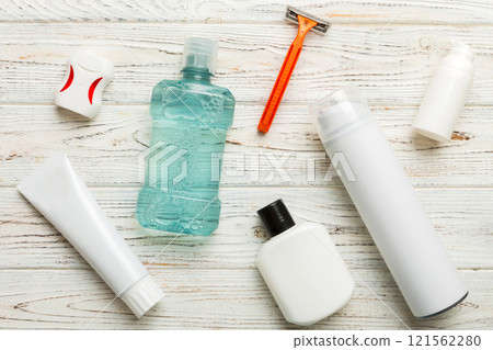 Mockup for bathing products top view flat lay, spa razor, toothpaste, soap, gel and other various accessories. Cosmetics for skin health. Bath Mockup for your logo 121562280