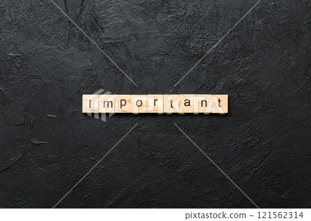 important word written on wood block. important text on cement table for your desing, concept important word written on wood block. important text on cement table for your desing, concept 121562314