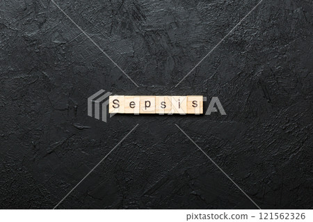 Sepsis word written on wood block. Sepsis text on cement table for your desing, concept 121562326