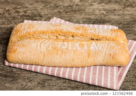 Fresh homemade crisp bread on napkin, top view. Healthy unleavened bread. French bread. Top view Bakery products 121562498